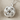 Gordian Knot Pendant, polished, product photo on linen