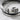 Extreme close-up detail of the sculpted silver fingers and oxidized wrist cuff on the holding hand wrap ring