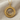 Hittite Sun Standard Pendant, gold vermeil, product photo on fabric