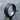Love Is Love Ring in polished silver, angled side view on wet stone
