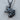 Fox Head Pendant, black rhodium, side profile view on wood