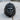 Indian Chief War Bonnet Ring, black rhodium plated, front view on wood