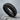 Ribbed Band Ring, black rhodium, product photo on stone surface