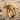 Standing Elephant Ring, gold vermeil, product photo on sand