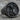 Praying Angel Medallion Ring, black rhodium, angled product view on stone surface