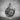Stallion Horseshoe Pendant, oxidized silver, front view on stone