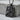 Queen of Spades Card Pendant, black rhodium, product photo on stone display