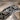 Acanthus Posy Wedding Ring, oxidized, close-up of leaf relief and crosshatch background