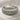Chevron groove ring, two-tone finish, studio product photo