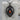 Byzantine Carnelian Acanthus Pendant, black rhodium, angled studio photo