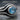 Blue Topaz Ripple Stacking Ring, oxidized silver, close-up of bezel-set blue topaz