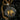 Reversible silver angel demon pendant showing the gold-plated archangel side with 'Light Against Darkness' inscription.
