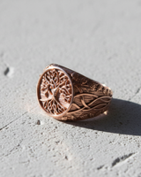 Rose gold plated silver Yggdrasil ring featuring Tree of Life design and Celtic knot side details