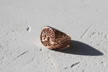 Rose gold plated silver Yggdrasil ring featuring Tree of Life design and Celtic knot side details