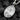Polished silver Saint Boniface religious medallion showing intricate relief craftsmanship