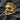Gold plated variation of the worn idol ring displaying the intricate facial features and relief depth