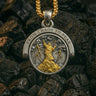 Silver Stormborn Climber Pendant's 'Chaos' side, featuring a gold-plated figure on a peak with lightning bolts.