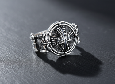 Sterling silver knight cross ring with an oxidized finish, featuring a detailed medieval cross on a textured surface.