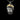 Angled view of the handcrafted Silver Zeus Pendant, highlighting the oxidized details in the beard and the polished gold crown.