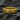 Gold vermeil rock texture ring with rugged stone design on dark background