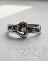 Side view of 925 sterling silver promise ring with engraved text and wrapping heart design