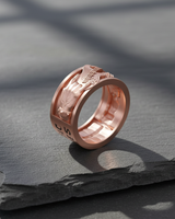 Rose gold variation of rock n roll guitar ring highlighting intricate musical motifs and craftsmanship