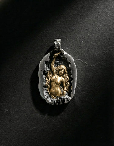 Detailed view of self carving female figure pendant symbolizing empowerment and strength