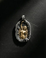 Two-tone silver and gold self made woman pendant featuring female figure sculpting herself
