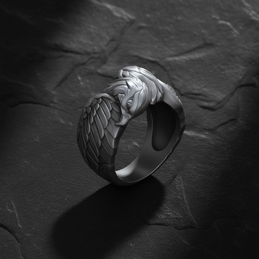 Angled shot of sterling silver eagle ring displaying the dual head design and sturdy band construction for men