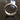 Top-down view of the handcrafted geometric silver ring highlighting its architectural beveled edges and durable build.