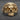 Gold version of the ornate skull ring highlighting the intricate gothic design, sharp teeth, and detailed filigree.