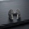 Front view of 925 sterling silver angel wing ring showing open adjustable design and oxidized details
