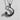 Twisted Crescent Star Pendant, black rhodium, front view with chain on textured stone