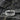 925 sterling silver wedding band featuring rugged textured center design with polished smooth edges for men