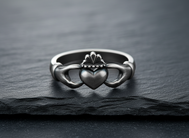 Front view of Celtic Claddagh ring in silver displaying heart and crown symbols representing love loyalty and friendship