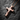Rose gold plated silver cracked cross pendant with embedded red stones on dark textured background