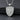 Front view of silver religious shield pendant with St Michael relief and patterned bail on dark stone surface