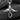 Angled view of infinity angel pendant design highlighting the smooth polished curves and wing texture details