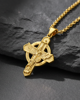 Angled close-up of Saint Michael cross pendant highlighting intricate relief work and spiritual symbolism