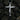 Angled view of handcrafted silver Jesus on the cross pendant emphasizing oxidized finish and depth