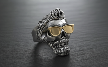 Front view of handcrafted 925 sterling silver biker skull ring featuring gold glasses and pompadour hairstyle