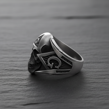 Side profile of silver freemason ring displaying intricate gothic skull details and masonic emblems on dark stone background