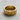 Top-down view of the craggy Silver Mountain Ring in black and white, showing the uneven edges and smooth inner band.