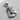 Angled side view of religious sterling silver pendant displaying the bail and three-dimensional relief of the Jesus bust