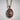 Saint Clare Pendant, rose plated silver, front view