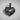 Interlocking Hands Heart Pendant, black rhodium, front view on textured white surface