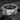 Angled view of the handcrafted silver music instrument ring, revealing the depth of the embossed guitar and violin details.