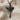 Winged Lion Sword Pendant, black rhodium plated, front view on fabric