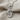 Treble Clef Note Pendant, polished silver, product photo on fabric
