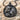 Leo Zodiac Medallion Pendant, black rhodium, front view on sand and shells
